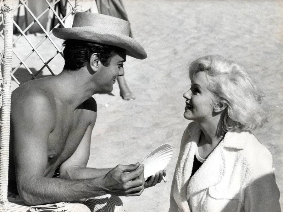 Tony Curtis and Marilyn Monroe rehearsing on the beach